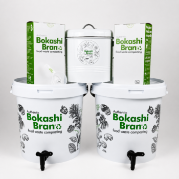 Bokashi composting kit — two 20L buckets with taps, stainless steel kitchen caddy, and 2 x 1kg Bokashi Bran.